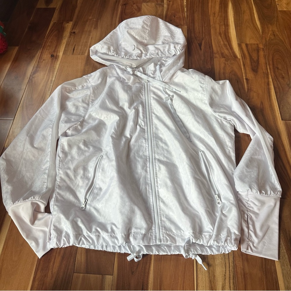 ZYIA Active Hooded Windbreaker with White Leopard design. Size M